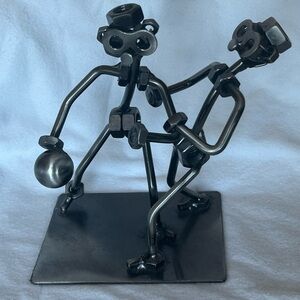 Metal Nuts and Bolts playing basketball sculpture